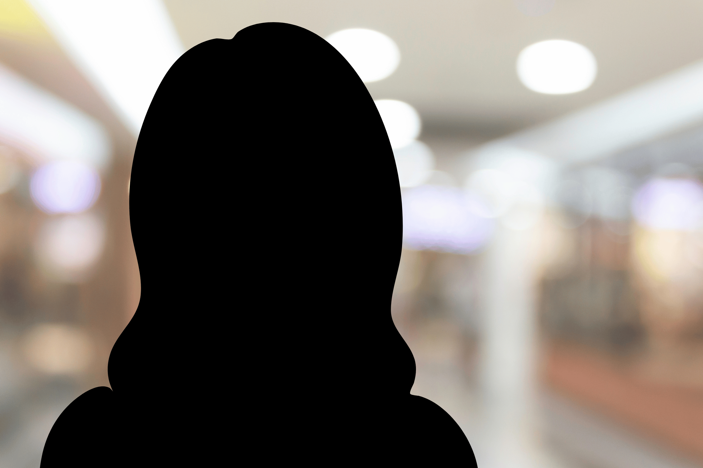 grey animated silhouette of a female in a suit