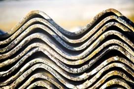 stack of roof tiles affected by asbestos exposure