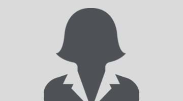 grey animated silhouette of a female in a suit