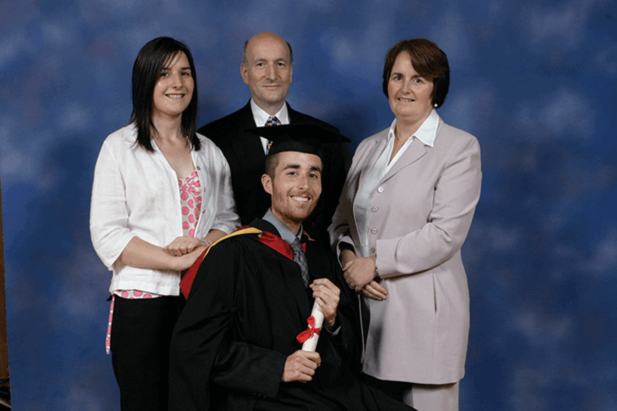 Jake Thompson with his family at his graduation.