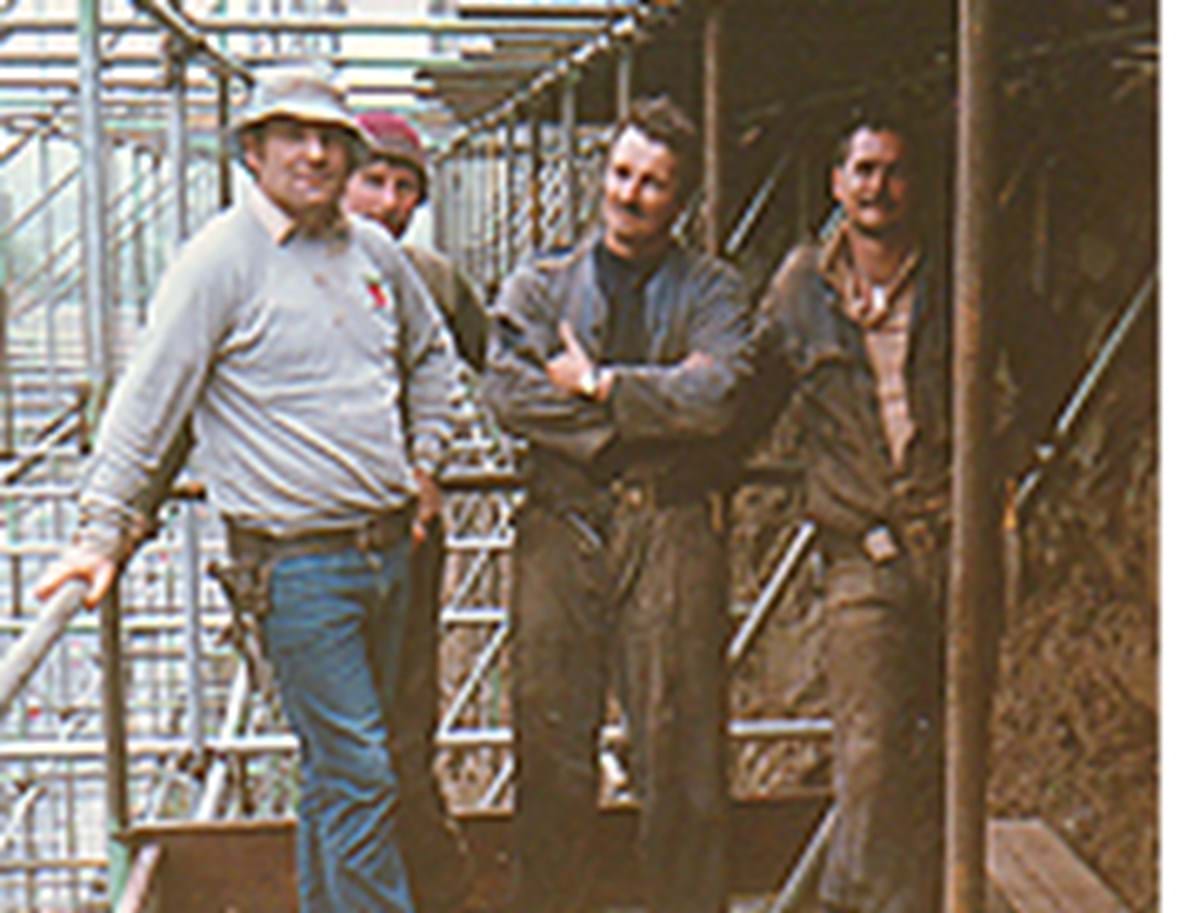 picture shows, left to right: Peter James; an unidentified former colleague; Phillip Thomas; and a second unidentified former colleague