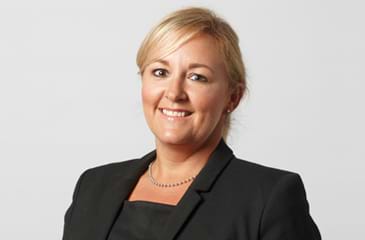 Nicola Saunders a serious injury and medical negligence lawyer for Thompsons wearing a black suit