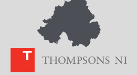 thompsons solicitors logo on light grey background with dark grey outline of northern ireland