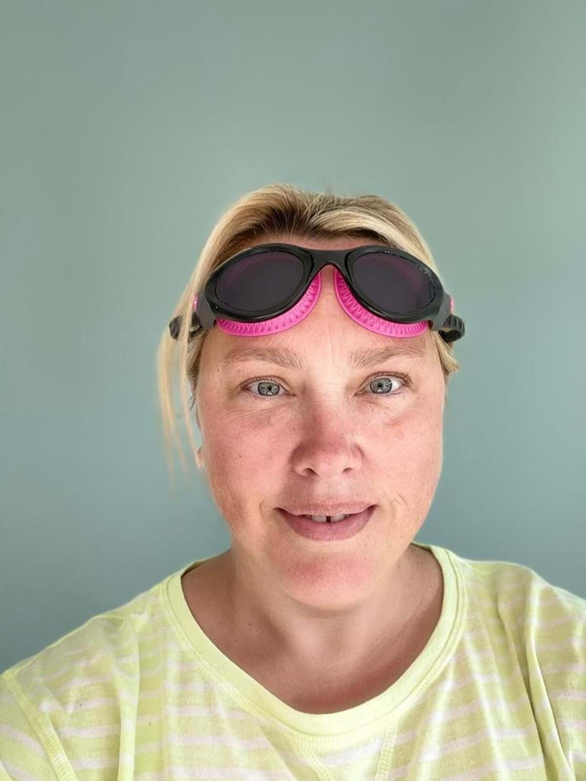 Cath Cladingbowl, regional manager for Wales at Thompsons, who swam 100 lengths a week