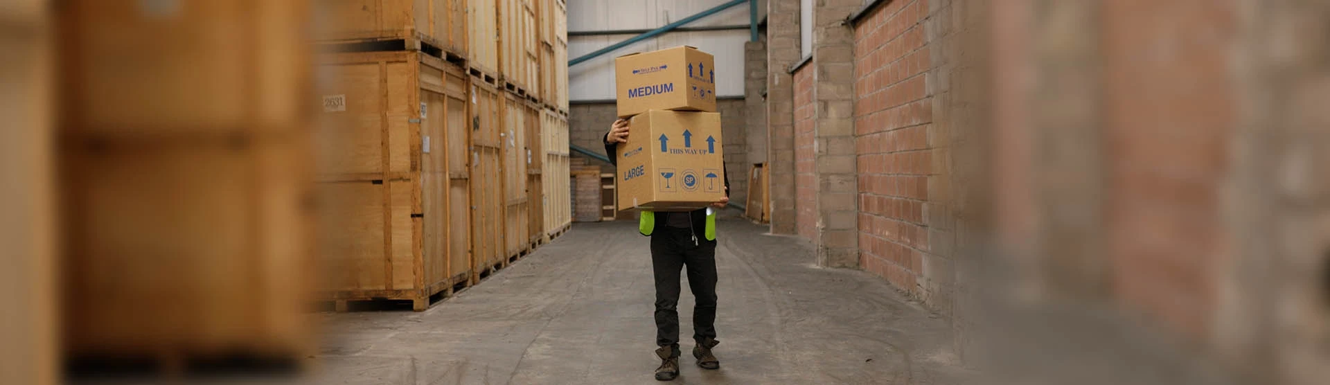 A man in the workplace representing our manual handling injury claims. 