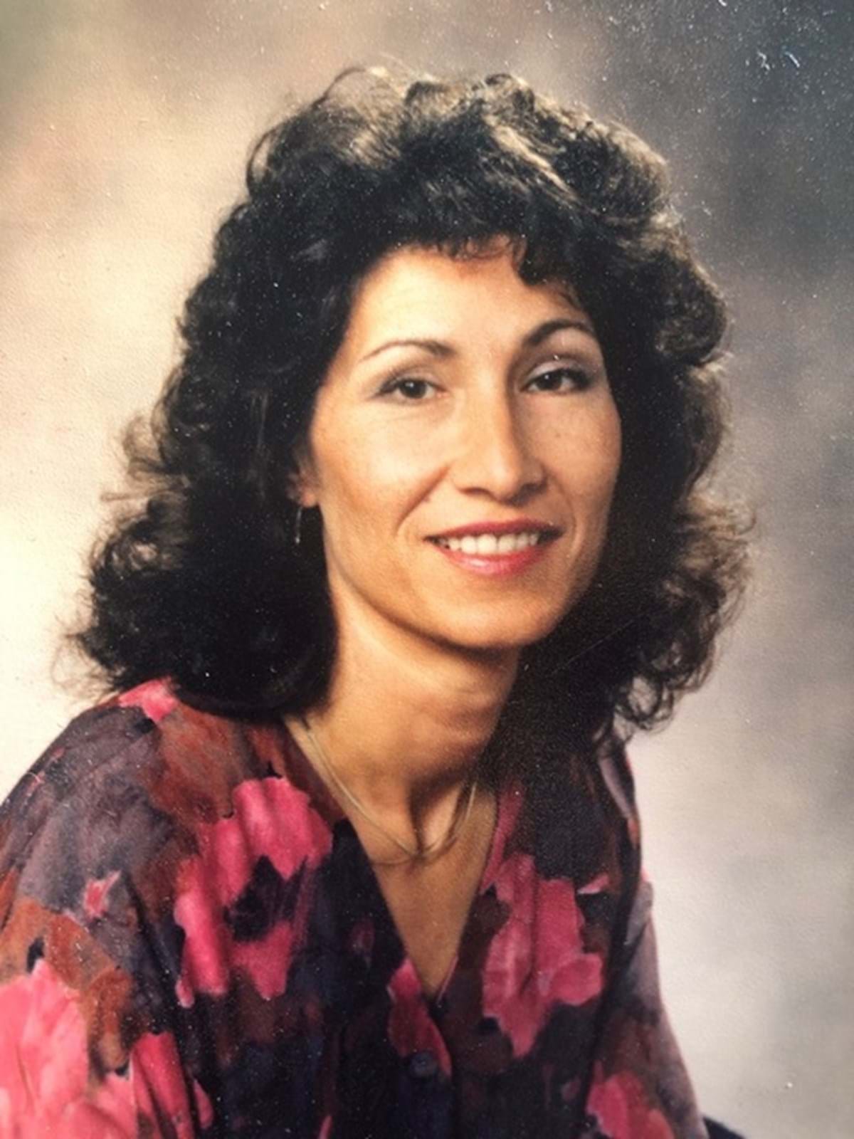 A woman smiling