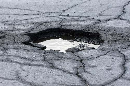 Pothole in road