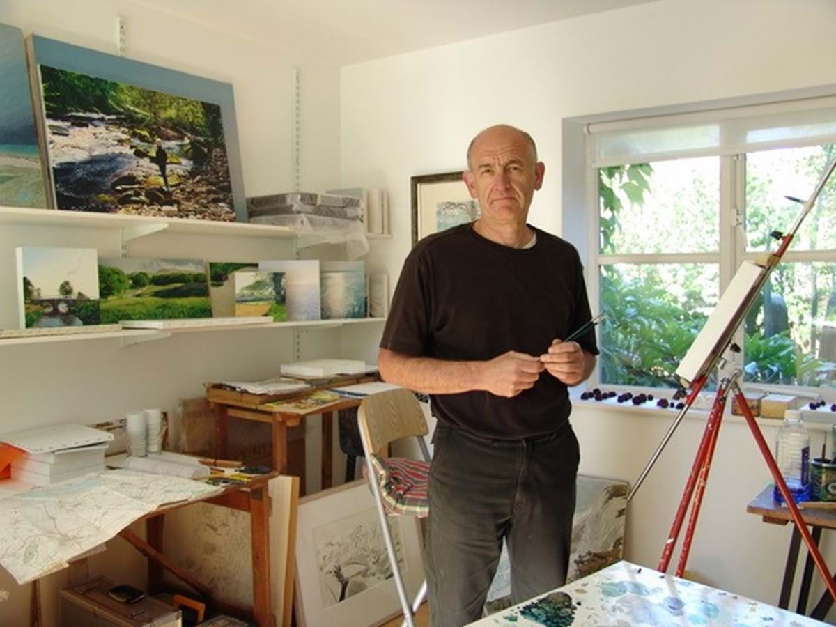 A man holding a paintbrush