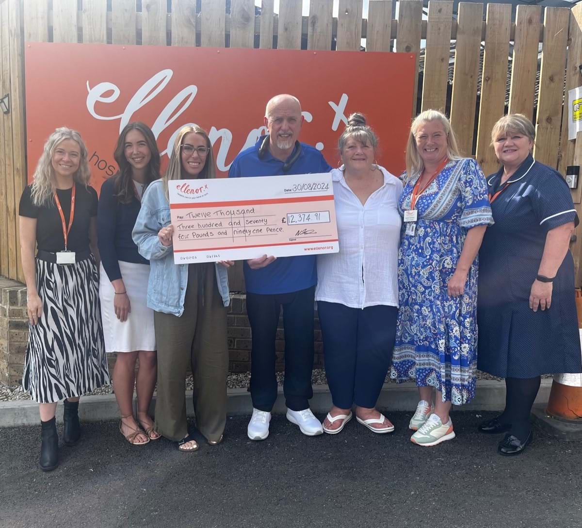 Photo of Masie and Hannah from the Hospice’s Individual Giving Team, Norman and Vicki Scott, Nobby’s counsellor, Sophie, and Nobby’s hospice at home nurse, Debbie.