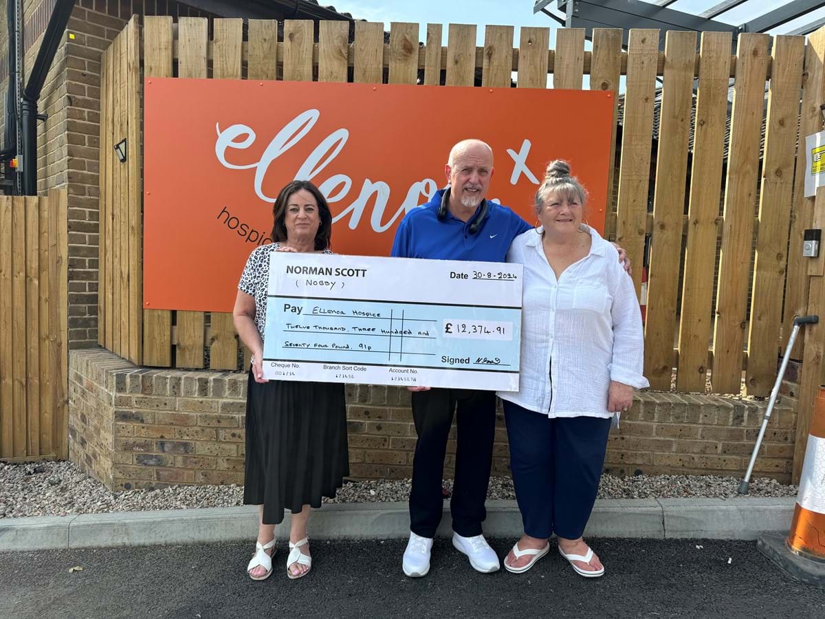 Jackie Wood from Thompsons Solicitors with Mr and Mrs Scott.